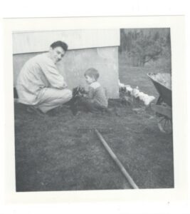Scott and his dad planting flowers